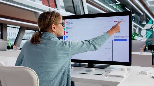 Female Worker Checking Software Support Tickets