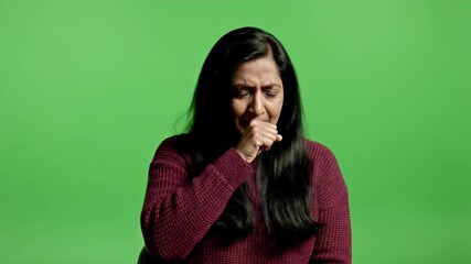 Woman Coughing Isolated on Green Screen Background: Indicating Illness Symptoms, Health Alertness, and Medical