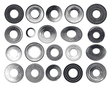 A collection of various concentric circles with textured black lines on a white background - Powered by Adobe