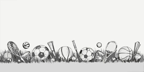 A variety of sports equipment arranged amongst blades of grass