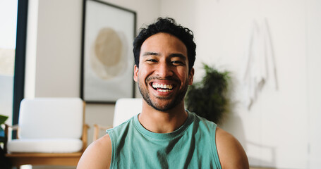 Property, portrait and man in living room with pride, fresh start and investment in dream house. Success, real estate and happy male with confidence, relocation and achievement for new homeowner.