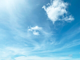 Blue sky filled with bright white clouds