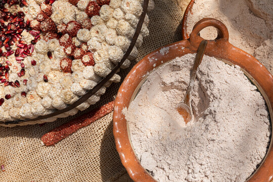 Ground corn flour with corn cobs around in Mexico