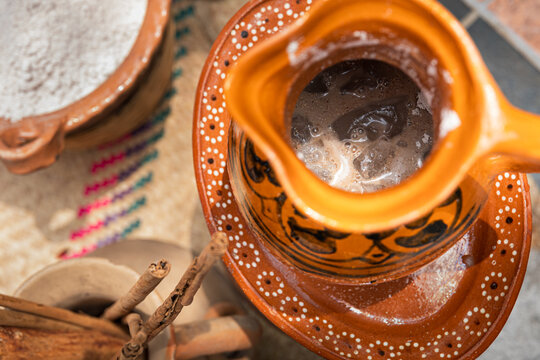 View inside pitcher with mixed beverage and ice