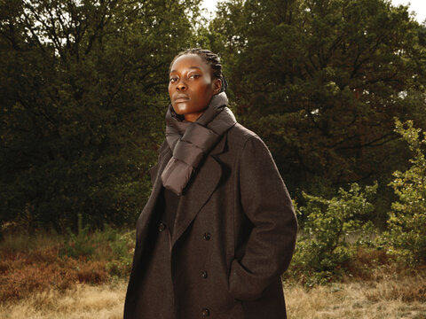 Elegant Black woman in Autumn outfit 