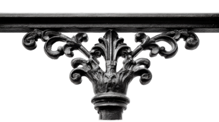 Ornate wrought iron fence detail featuring classic decorative fleur-de-lis motif with intricate swirls on transparent background