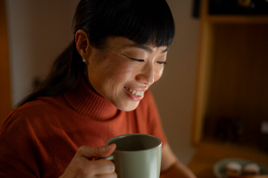 Woman enjoying a warm drink