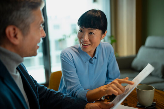 Business colleagues discussing document during an office meeting