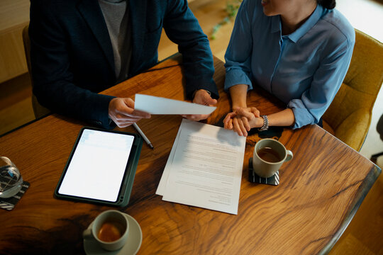 Business people discussing contract during a corporate meeting
