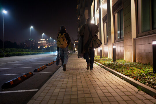 Arriving at a Modern Residential Complex at Night