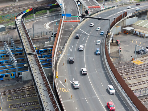 Traffic rounding a bend on a freeway overpass