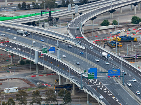 Traffic rounding a bend on a freeway overpass
