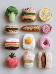 Collection of knitted food items, including a sandwich, a donut, and a cup