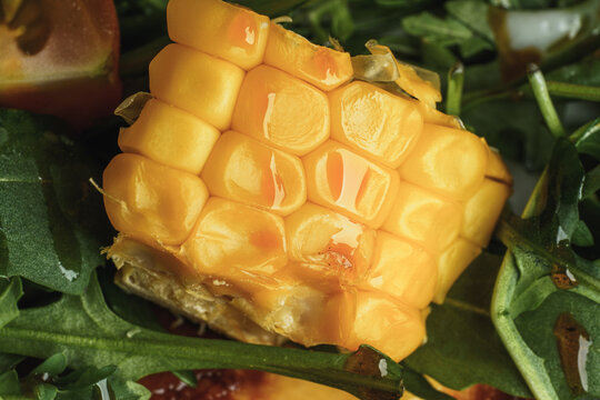 Close-Up of Corn on Salad Greens