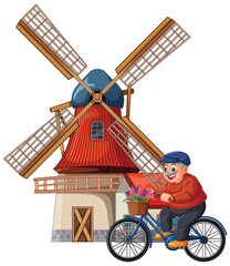 Elderly Man Cycling Past Traditional Windmill with Flowers