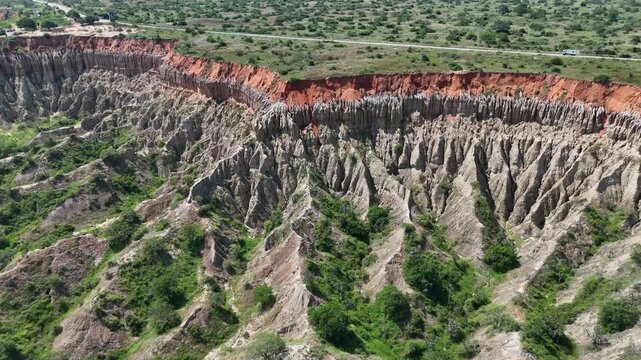 Breathtaking aerial panorama of the eroded clay formations at Miradouro da Lua (Viewpoint of the Moon) in Belas Municipality, Luanda Province, Angola, Africa