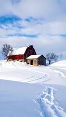 A snowy landscape features a weathered barn and shed nestled on a hill under a partly cloudy sky with fresh footprints