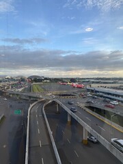 Pasay City Philippines view of a city under a partly cloudy sky