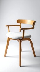 A solitary chair, constructed from light-colored wood, featuring a curved back, armrests, and a white cushioned seat. Simple, modern design