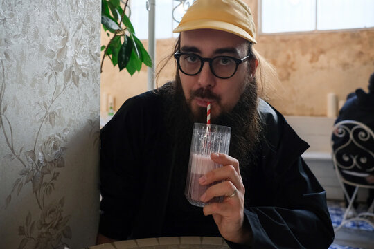 Man Drinking Smoothie Indoors