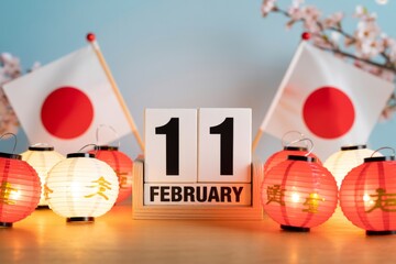Japanese national foundation day display with flags, lanterns, calendar