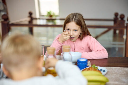 Kids have breakfast at home