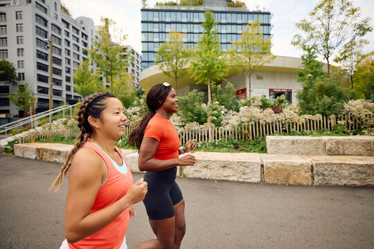Women running in town