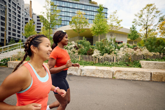 Women running in town