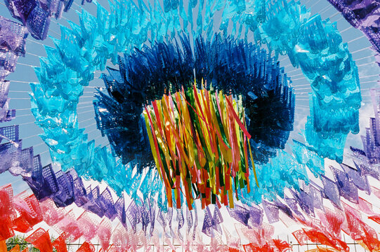 Film photo of a colorful explosion of papel picado from above