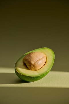 A vibrant halved avocado showcasing its creamy interior