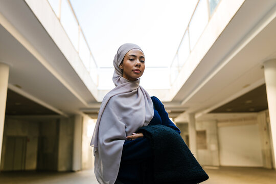 Muslim woman in hijab showing confidence and fashion