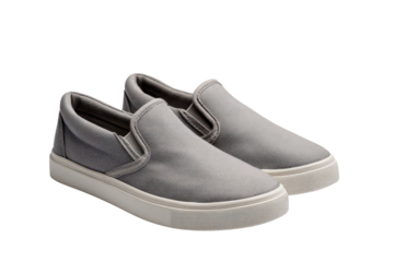 Pair of grey canvas slip on shoes with white rubber soles on black background footwear