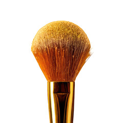 Close-up of a makeup brush, gold and brown, black bkg