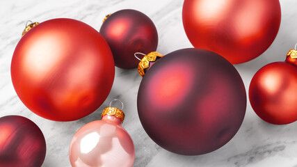 Red christmas ball baubles on marble table, closeup, holiday concept