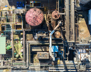 Aerial View of Industrial Plant with Tanks and Pipes