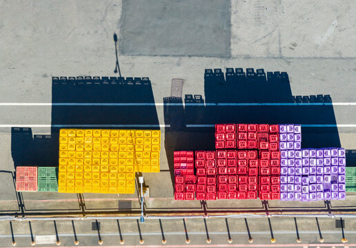 Logistics Yard Colorful Stacked Plastic Crates Top-Down View: 