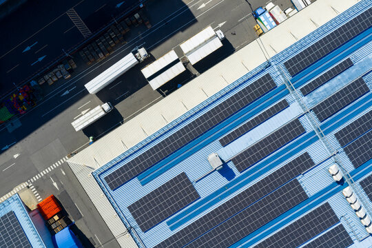 Aerial View of Gull Wing Trucks at Solar Powered Warehouse
