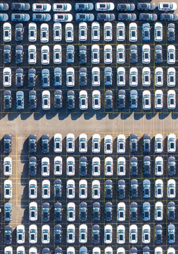 Aerial View of New Cars in Organized Dealership Parking Lot