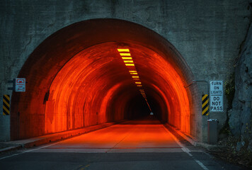 Entrance of Wawona Tunnel at dusk, a nearly mile-long granite tunnel on Wawona Road. Yosemite...