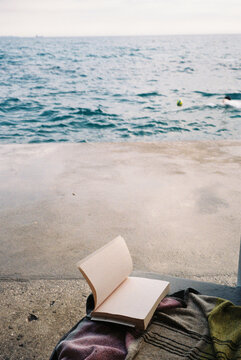 Open book by the sea

