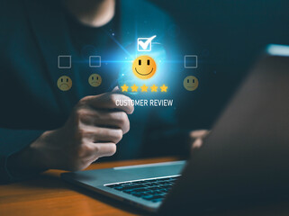Fototapeta premium Customer review and satisfaction survey concept with five star rating and smiley feedback icons on digital interface, representing service quality, positive experience, customer engagement