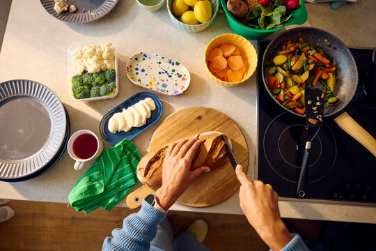 Cutting freshly baked bread