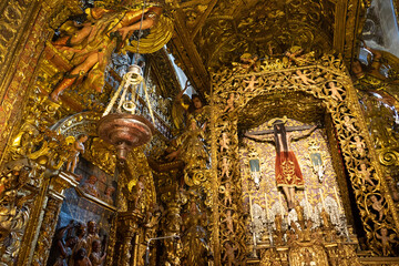 Fototapeta premium Intricate golden altar with religious figures.. Orense Cathedral, Spain