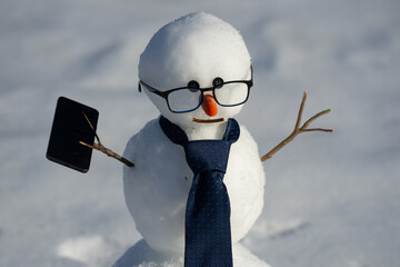 Winter Connection. Snowman Remote Work. Smart Snowman working Online. Winter Phone Sale. Calling Santa. Snow Chat. Snow Man Talks Business. Winter Holiday Greetings Online. New Year Call from Snowman. © Volodymyr