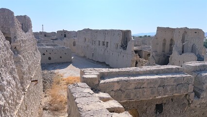 Bright Courtyard With Ancient Walls, Luminous Open Area Featuring Weathered Walls And Layered Terraces, Radiant Courtyard Of Old Fortress With Varied Levels And Shadows Emphasizing Its History