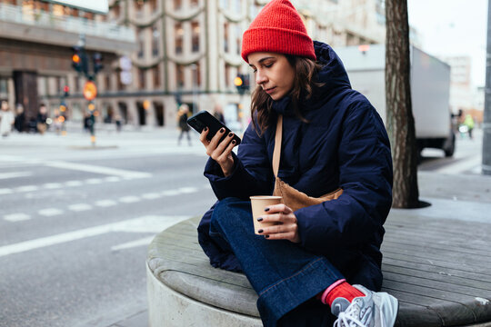 Woman With Coffee in Winter City