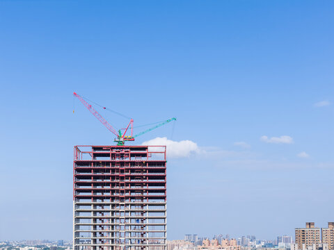 High Rise Building Under Construction with Tower Crane