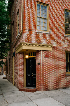 Brick house with a corner door