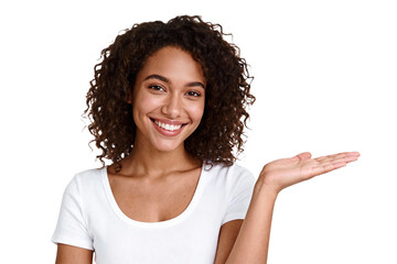 Smiling woman with curly hair presenting with open palm