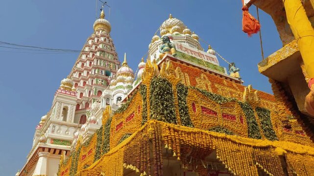 Shri Khandoba Temple at Pal! The vibrant yellow and green garlands are indeed a prominent feature, especially during the annual yatra festival.